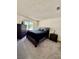 This primary bedroom features neutral walls, carpeted floors, and a view to the outside at 4662 Kelly Barry Way, Las Vegas, NV 89121