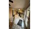 Spacious kitchen with island, stainless steel appliances, and access to outdoor patio at 4662 Kelly Barry Way, Las Vegas, NV 89121
