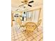 Kitchen with an adjacent dining area featuring wicker chairs and stainless steel appliances at 4662 Kelly Barry Way, Las Vegas, NV 89121