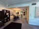 Open-concept living room with a view of the dining area and staircase at 4662 Kelly Barry Way, Las Vegas, NV 89121
