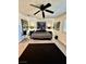 Spacious bedroom with modern decor, a dark rug, and serene ambiance at 4662 Kelly Barry Way, Las Vegas, NV 89121