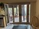 View of the patio through glass doors showcasing outdoor seating at 4662 Kelly Barry Way, Las Vegas, NV 89121