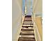 Carpeted staircase with white railing leading to upper level of the home at 4662 Kelly Barry Way, Las Vegas, NV 89121