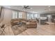 Spacious open-concept living area with modern furnishings, connecting seamlessly to the kitchen at 48 Verde Rosa Dr, Henderson, NV 89011