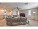Upstairs living room with large sectional, TV, and recessed lighting at 48 Verde Rosa Dr, Henderson, NV 89011