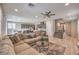 Spacious open-concept living area with modern furnishings, connecting seamlessly to the kitchen at 48 Verde Rosa Dr, Henderson, NV 89011