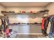 Spacious walk-in closet with ample shelving and hanging space for clothes and accessories at 48 Verde Rosa Dr, Henderson, NV 89011