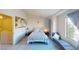 Well-lit bedroom with high ceilings, a lounge chair, and a large window with bright natural light at 50 Belle La Blanc Ave, Las Vegas, NV 89123