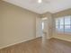 Bedroom featuring wood-look floors and a view of the hallway through the door at 50 E Serene Ave # 420, Las Vegas, NV 89123