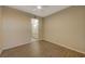 Bedroom featuring wood-look floors and a view of the bathroom through the door at 50 E Serene Ave # 420, Las Vegas, NV 89123