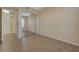 The light-filled bedroom includes wood vinyl flooring and mirrored sliding closet doors at 50 E Serene Ave # 420, Las Vegas, NV 89123