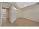 Comfortable bedroom with a view of the closet, natural light and wood-look floors at 50 E Serene Ave # 420, Las Vegas, NV 89123