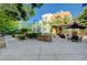 A lovely patio area with an outdoor kitchen area and covered seating at 50 E Serene Ave # 420, Las Vegas, NV 89123
