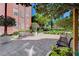 Beautiful landscaped courtyard featuring benches, lush greenery, and a tranquil atmosphere at 50 E Serene Ave # 420, Las Vegas, NV 89123