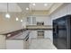 This kitchen features granite counters, stainless steel appliances, and ample white cabinetry at 50 E Serene Ave # 420, Las Vegas, NV 89123