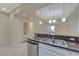Spacious kitchen features granite countertops and modern stainless steel appliances at 50 E Serene Ave # 420, Las Vegas, NV 89123