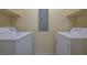 A laundry room with new appliances offers convenience and functionality at 50 E Serene Ave # 420, Las Vegas, NV 89123