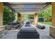 Outdoor entertainment space with cozy seating, pergola, and a fire pit at 50 E Serene Ave # 420, Las Vegas, NV 89123