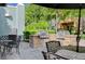 Outdoor kitchen area includes a grill station and seating for entertaining at 50 E Serene Ave # 420, Las Vegas, NV 89123