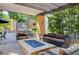 The outdoor space includes an outdoor kitchen, seating, and a fire pit at 50 E Serene Ave # 420, Las Vegas, NV 89123