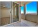 An open patio with a sliding glass door to the interior of the home at 50 E Serene Ave # 420, Las Vegas, NV 89123