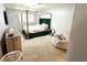 Bedroom with a plush queen-sized bed, TV, and carpeted floor at 5024 Starfinder Ave, Las Vegas, NV 89108