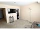 Bedroom with TV, closet, and neutral carpeting at 5024 Starfinder Ave, Las Vegas, NV 89108
