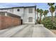 Exterior of a two-story home with desert landscaping and a spacious driveway at 5024 Starfinder Ave, Las Vegas, NV 89108
