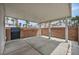 Covered patio with a brick wall and a backyard view of the neighborhood at 5024 Starfinder Ave, Las Vegas, NV 89108