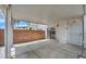 View of the covered patio showing the entrance and decorative security screen door at 5024 Starfinder Ave, Las Vegas, NV 89108