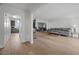 Bright, open living room with hardwood floors and view of the kitchen and dining area at 530 Tam O Shanter, Las Vegas, NV 89109