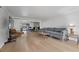 Bright, open living room with hardwood floors and sliding doors to backyard patio at 530 Tam O Shanter, Las Vegas, NV 89109