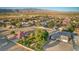 Residential single-story home with mature landscaping, well maintained lawn and fully enclosed yard in desert community at 5701 Mary Lou St, Pahrump, NV 89061