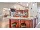 Well-equipped kitchen with modern fixtures and a convenient breakfast bar seating area at 5701 Mary Lou St, Pahrump, NV 89061