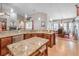 Open concept kitchen with granite island overlooking dining area, ideal for entertaining at 5701 Mary Lou St, Pahrump, NV 89061