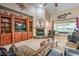 Spacious living room features a cozy fireplace and custom built-in shelving at 5701 Mary Lou St, Pahrump, NV 89061