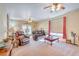 Open-concept living room with classic furnishings and a relaxed atmosphere at 5701 Mary Lou St, Pahrump, NV 89061