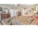 Well-lit primary bedroom showcasing a large bed, dresser, and stylish furnishings at 5701 Mary Lou St, Pahrump, NV 89061