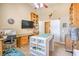 Bright craft room featuring custom built-ins, work areas, and a comfortable seating at 5701 Mary Lou St, Pahrump, NV 89061
