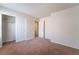 Bright bedroom with closet featuring plush carpeting at 6412 Dimatteo St, Las Vegas, NV 89148