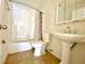 Bathroom featuring a shower-tub combo, toilet, and vanity sink at 6968 Hopkins Dr, Las Vegas, NV 89156