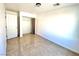 Bedroom features neutral walls and flooring with a closet at 6968 Hopkins Dr, Las Vegas, NV 89156