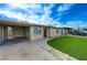 Charming home showcasing a well-kept front yard and convenient carport at 701 Harvard St, Las Vegas, NV 89107