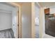 Hallway view showcasing doors, walls, and flooring at 701 Harvard St, Las Vegas, NV 89107