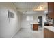 Eat in kitchen, featuring updated appliances and bright lighting at 701 Harvard St, Las Vegas, NV 89107