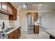 Eat in kitchen featuring stainless appliances and wood cabinets at 701 Harvard St, Las Vegas, NV 89107