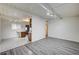 Living room area featuring wood-look floors, which flows into the kitchen at 701 Harvard St, Las Vegas, NV 89107