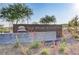 Tule Springs Regional Park sign with floral accents, benches, and clear skies at 7122 Red Gulch St, North Las Vegas, NV 89084