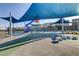 Community playground features a modern play structure with slides and climbing area at 7122 Red Gulch St, North Las Vegas, NV 89084