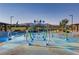 Community splash pad with arching water features and playground elements at 7122 Red Gulch St, North Las Vegas, NV 89084